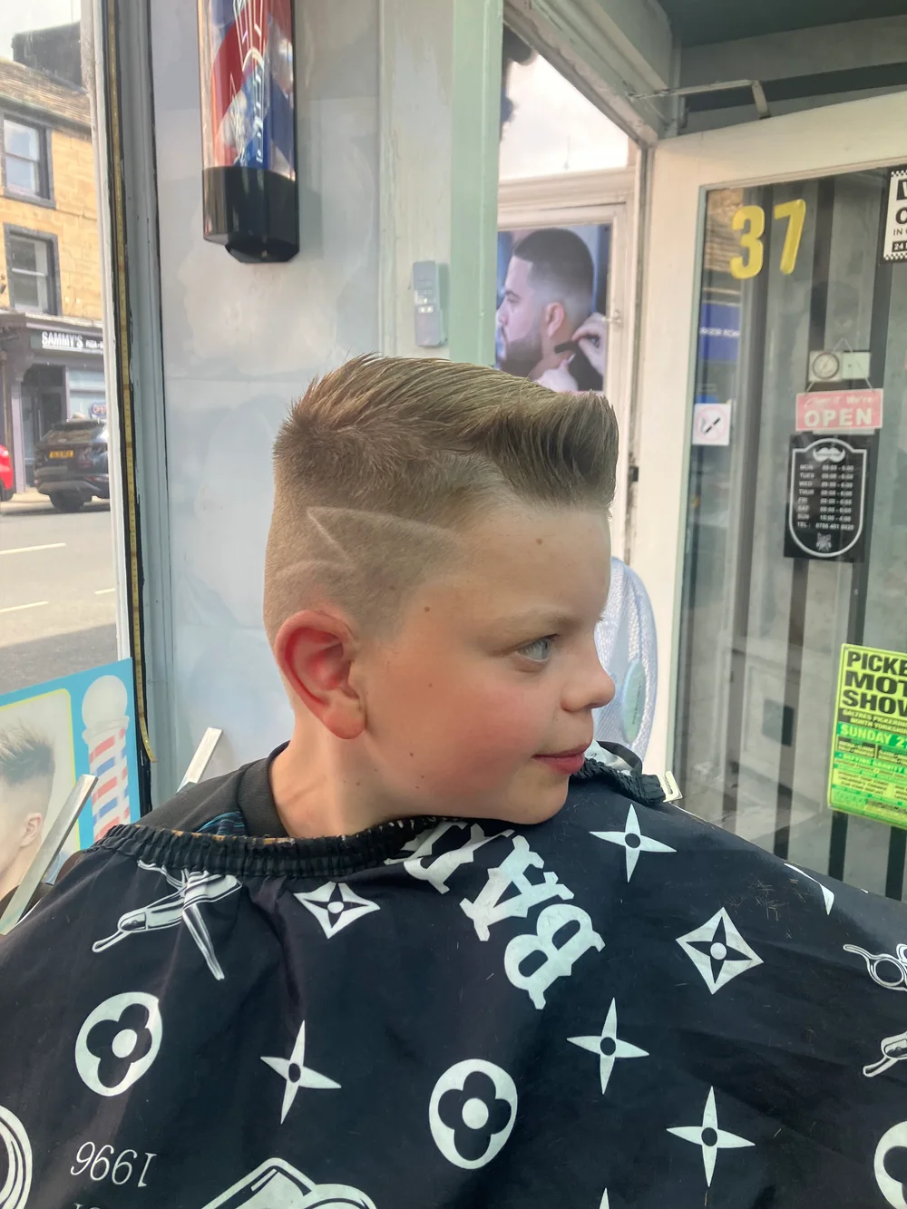 Finished haircut with a shaved line detail, photographed at the Kirkgate shop