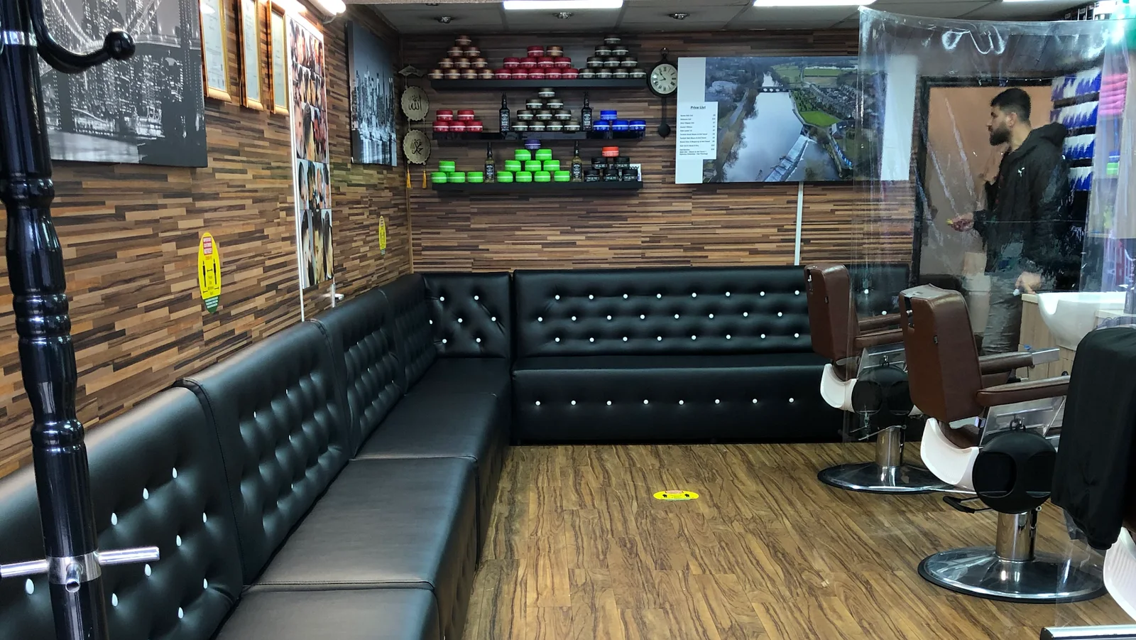 The wood-panelled shop interior and waiting bench at Antalya