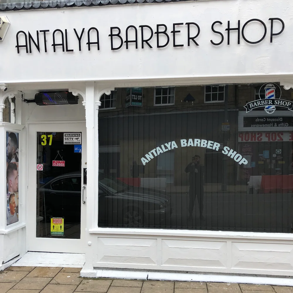 Antalya Barber Shop's white shopfront at 37 Kirkgate, Otley